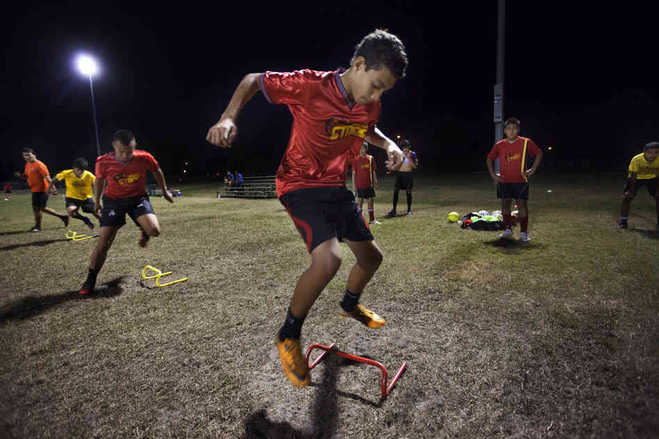 Louis Jimenez, 14, attends soccer practice for his team, the Orlando Stars, at the Archie Gordon Memorial Park in Kissimmee.