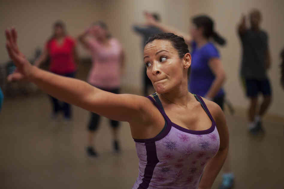 Melissa Colon dances in a zumba class at the Robert Guevara Community Center in Kissimmee.