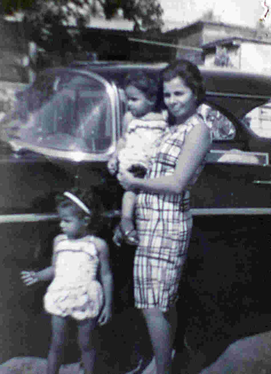 In this family photo, Arlene Bonet and her younger sister Genoveva are seen with their mother, also named Genoveva, in Puerto Rico.