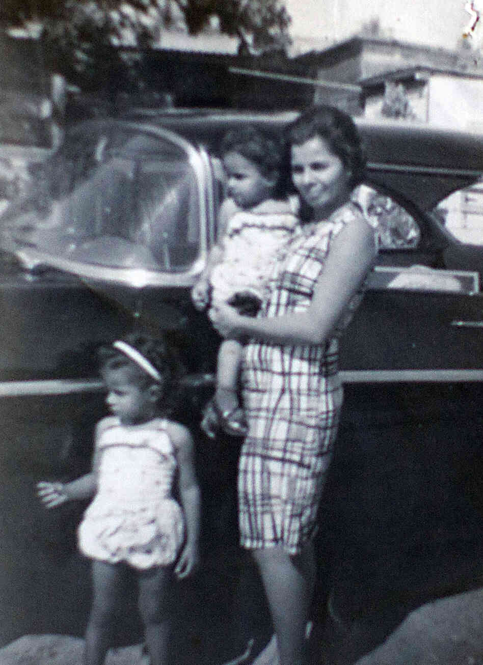 In this family photo, Arlene Bonet and her younger sister Genoveva are seen with their mother, also named Genoveva, in Puerto Rico.