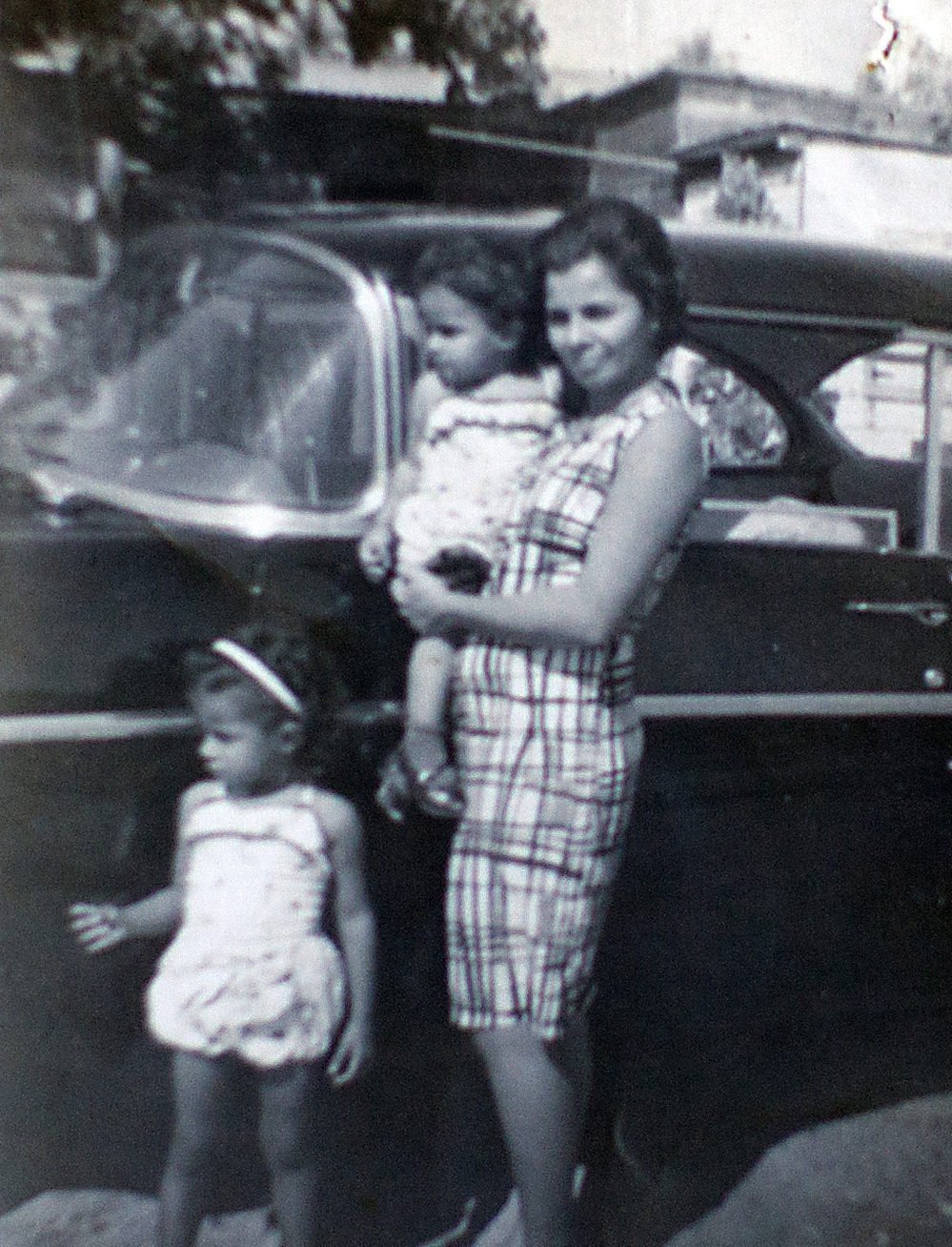 In this family photo, Arlene Bonet and her younger sister Genoveva are seen with their mother, also named Genoveva, in Puerto Rico.