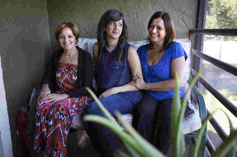 Arlene Bonet (right), shown with her daughter, Didra, and her sister Genoveva (left), lives in Orlando, Fla. Bonet's daughter, who works part time and attends college part time, lives with her.