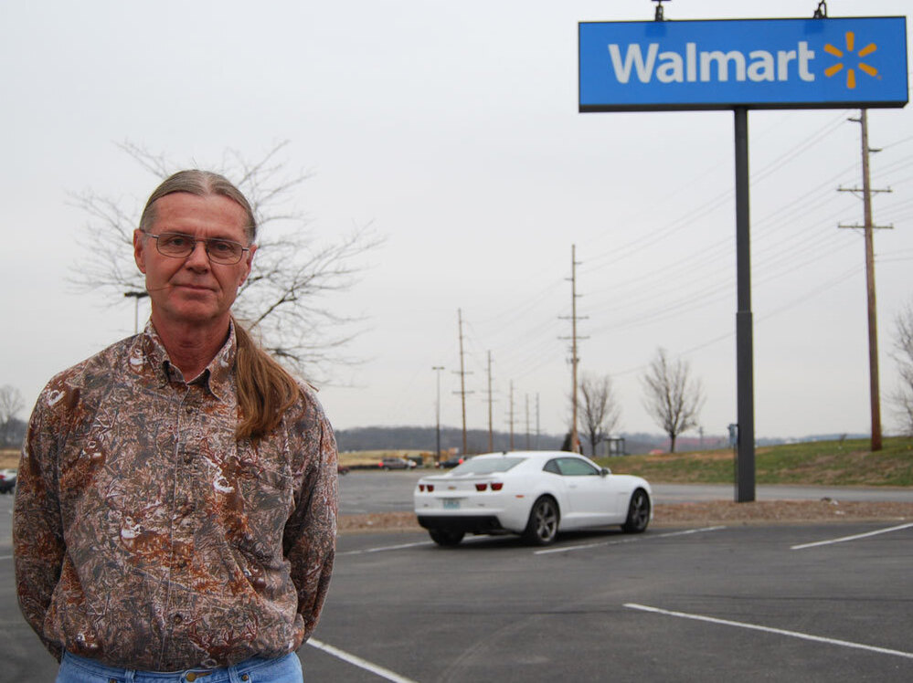 Produce broker Herman Farris,  outside a Wal-Mart in Columbia, Mo., was heading to St. Louis to pick up a shipment of bananas for Wal-Mart.
