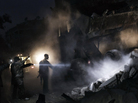 Syrians look for survivors amid the rubble of a building targeted by a missile in the al-Mashhad neighborhood of Aleppo on Jan. 7. Syrians look for survivors amid the rubble of a building targeted by a missile in the al-Mashhad neighborhood of Aleppo on Jan. 7.