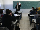 Palestinian students attend a class in the West Bank city of Ramallah on Sunday. Palestinian students attend a class in the West Bank city of Ramallah on Sunday.