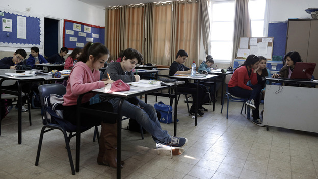 Israeli students attend class at an elementary school in the coastal city of Ashkelon. A U.S.-funded study released Monday said both Israeli and Palestinian textbooks present largely one-sided narratives of their conflict but rarely resort to demonization of the other side.