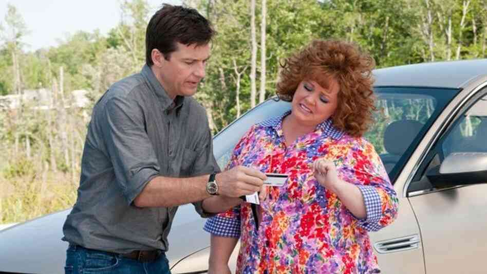 An overextended Sandy (Jason Bateman) must prevent the raunchy Diana (Melissa McCarthy) from continuing to use his identity as a financial crutch in Identity Thief. An overextended Sandy (Jason Bateman) must prevent the raunchy Diana (Melissa McCarthy) from continuing to use his identity as a financial crutch in Identity Thief.