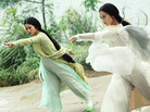The demon snake sisters (Charlene Choi and Eva Huang) disguise themselves as beautiful women in The Sorcerer and the White Snake. The demon snake sisters (Charlene Choi and Eva Huang) disguise themselves as beautiful women in The Sorcerer and the White Snake.