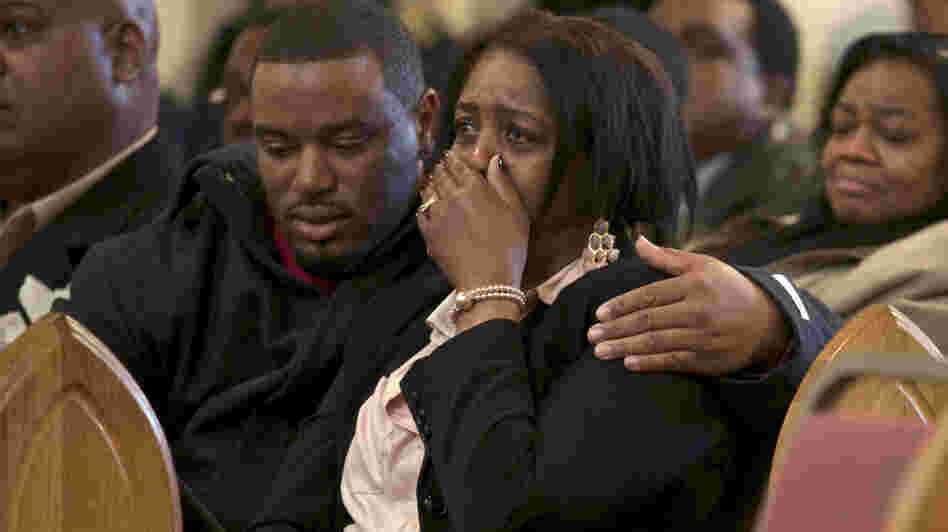 Shirley Chambers cries during Monday's funeral for her son Ronnie Chambers, 33. She had four children, three boys and a girl, all victims of gun violence in Chicago over a period of 18 years.