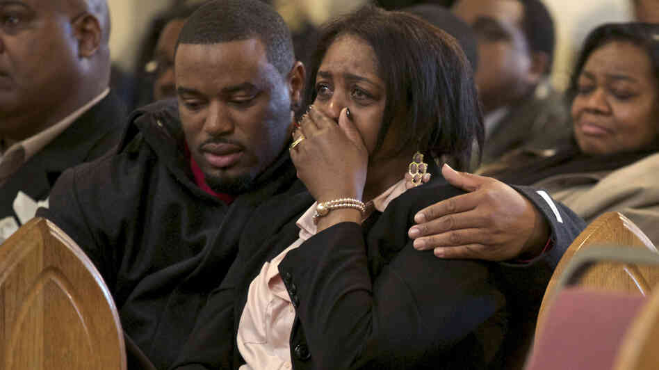 Shirley Chambers cries during Monday's funeral for her son Ronnie Chambers, 33. She had four children, three boys and a girl, all victims of gun violence in Chicago over a period of 18 years.