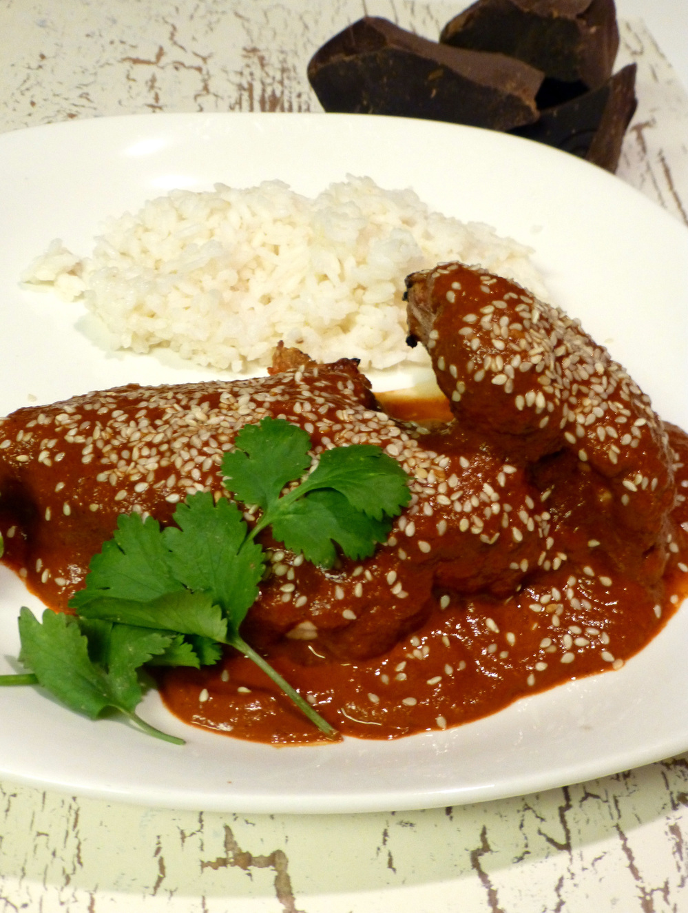 Here, Chocolate Mole is served over grilled chicken. But it's also commonly paired with pork