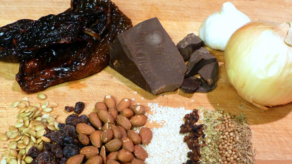 Mole is a complex sauce that marries chocolate with chilies, onion, garlic, spices, nuts and seeds and dried fruits. But it's just one of many ways to break chocolate out of the candy box.