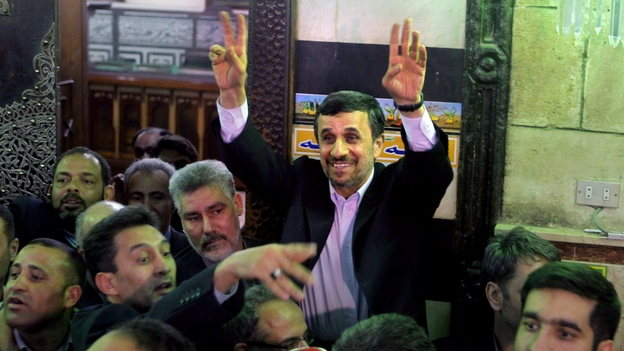 Iranian President Mahmoud Ahmadinejad visits an Islamic shrine Tuesday in Cairo. He became the first Iranian leader to visit Egypt since the 1970s.