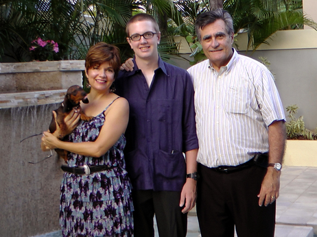 Julian Romero (center) is seen with his parents, Marie Rodriquez and Luis Romero, on his 20th birthday, April 18, 2011. He was stabbed to death later that night while celebrating with his girlfriend in the Condado neighborhood of San Juan, Puerto Rico.