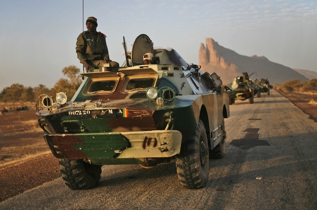 Malian troops near Hambori, northern Mali are driving toward Gao on Monday, Feb. 4, 2013.