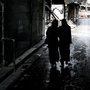 Syrian women walk through a market area in the northern city of Aleppo last November. A new website is documenting the use of rape in the Syrian conflict.