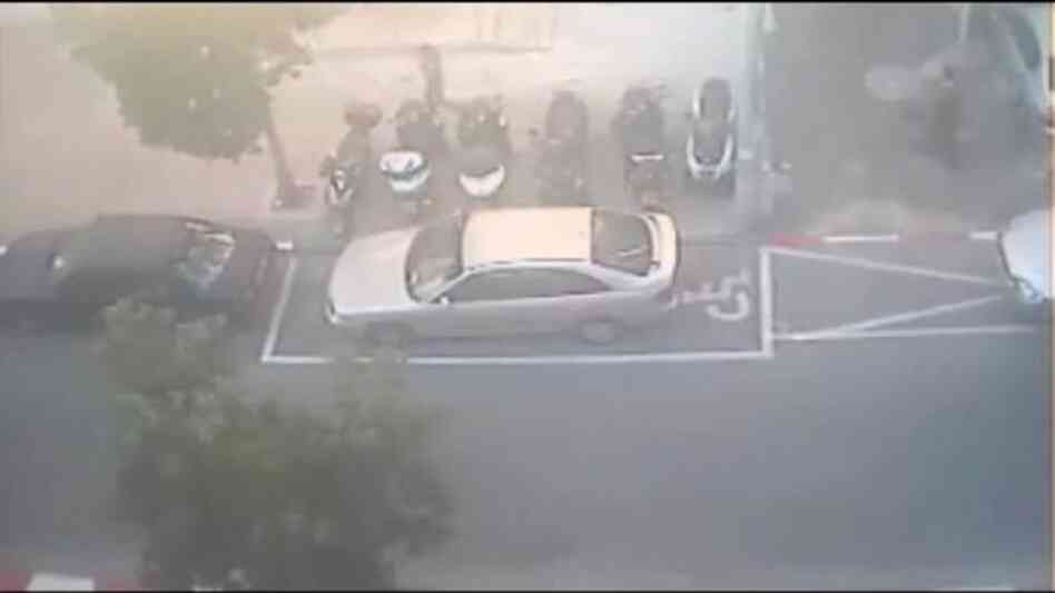 A car after it was painted into a handicapped space. A car after it was painted into a handicapped space.