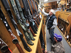 Jeff Torgerson (top) and Dan Volkman browse the selection of rifles at Mainstream Firearms and Marine in Winona, Minn., on Monday. Jeff Torgerson (top) and Dan Volkman browse the selection of rifles at Mainstream Firearms and Marine in Winona, Minn., on Monday.