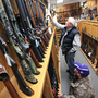 Jeff Torgerson (top) and Dan Volkman browse the selection of rifles at Mainstream Firearms and Marine in Winona, Minn., on Monday. Jeff Torgerson (top) and Dan Volkman browse the selection of rifles at Mainstream Firearms and Marine in Winona, Minn., on Monday.