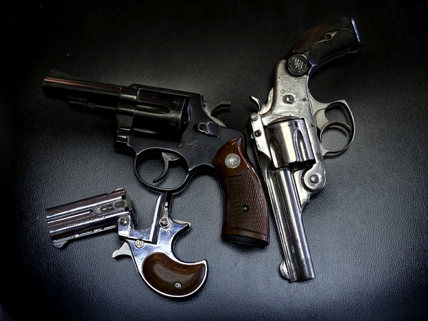 More than 400 guns, including these three, were turned in during a Dallas gun buyback program in January. But determining the effectiveness of such programs is difficult due to limits on gun-related research.
