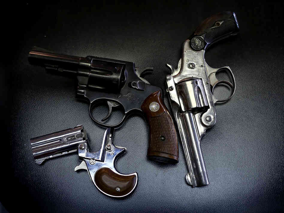 More than 400 guns, including these three, were turned in during a Dallas gun buyback program in January. But determining the effectiveness of such programs is difficult due to limits on gun-related research.