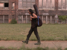 Rodriguez carries his guitar through Detroit, Mich., his hometown. Rodriguez carries his guitar through Detroit, Mich., his hometown.