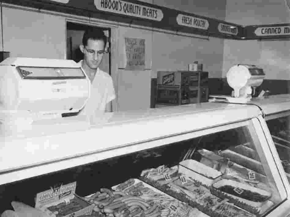The author's uncle, Hannibal Abood, worked the meat counter at the family's grocery store in the 1940s.