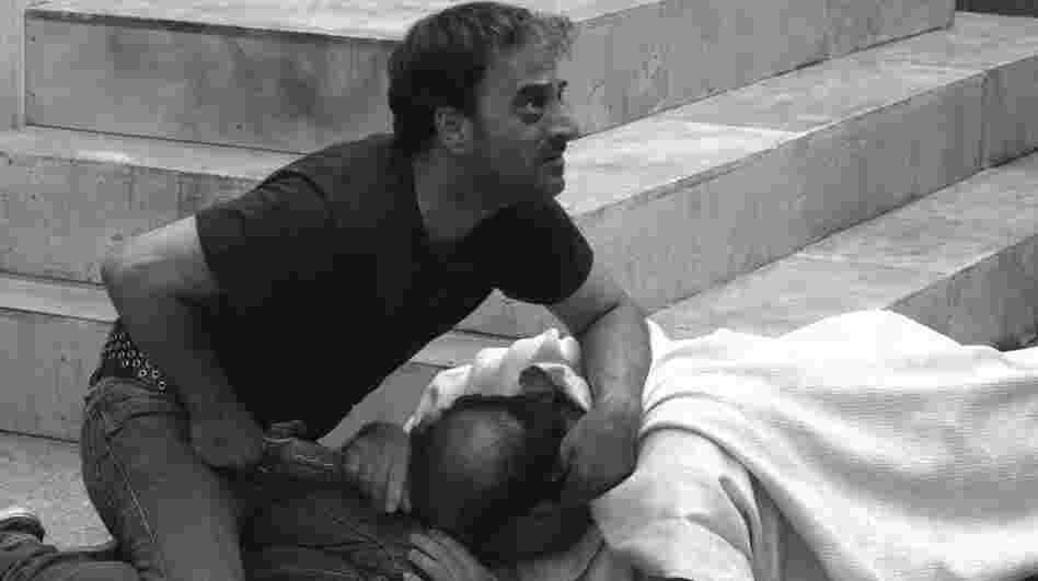 Brutus (Salvatore Striano) fixes a wild stare at the witnesses and conspirators after Julius Caesar's murder, in a scene from Paolo and Vittorio Taviani's Caesar Must Die.