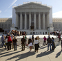 People wait in line to enter the Supreme Court as the term began in October. People wait in line to enter the Supreme Court as the term began in October.