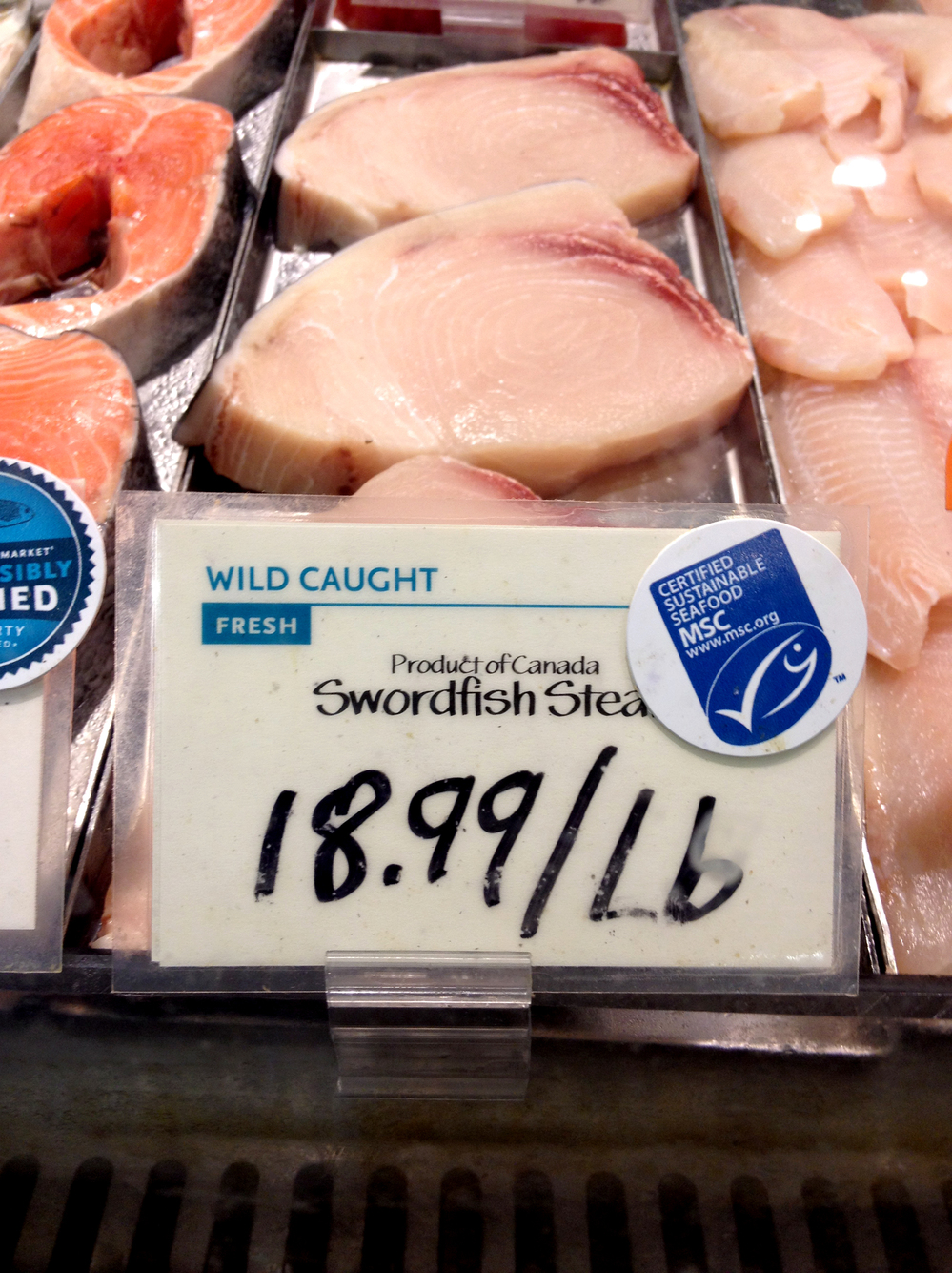 Swordfish from Canada is marked with a label from the Marine Stewardship Council at a Whole Foods in Washington, D.C. The MSC says its label means the fish were caught by a sustainable fishery, but critics says it's not always so clear.