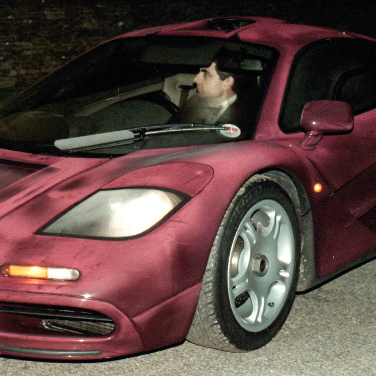 Before the crash: Rowan Atkinson at the wheel of his McLaren F1 in 1998.