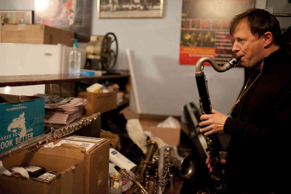 Chris Potter, backstage, warming up on bass clarinet.