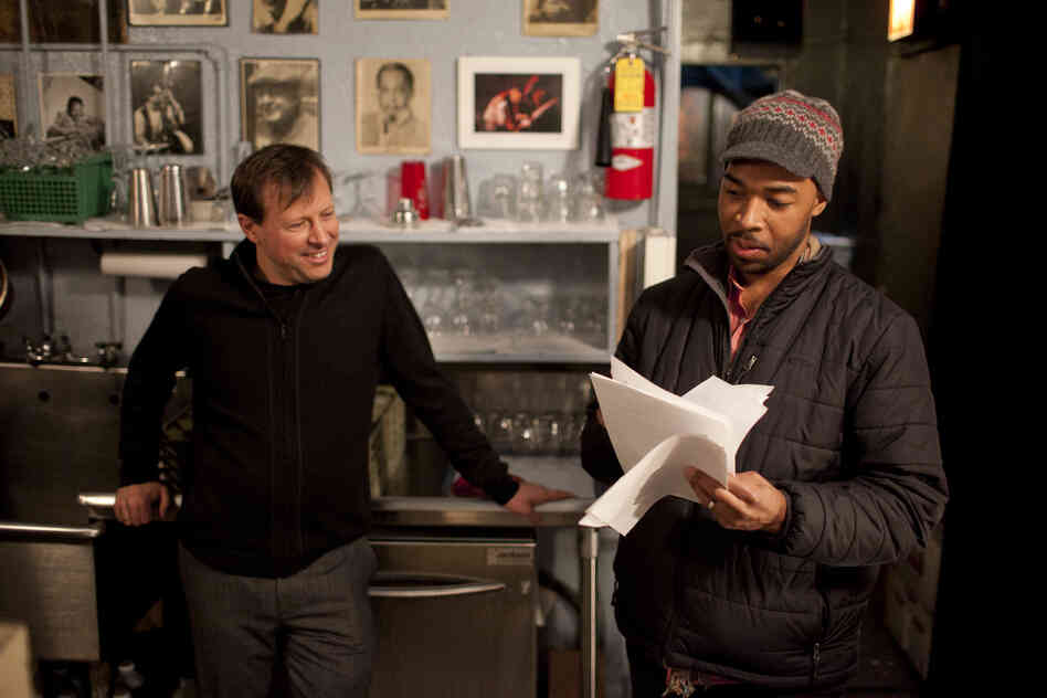 Chris Potter shows Eric Harland some music.