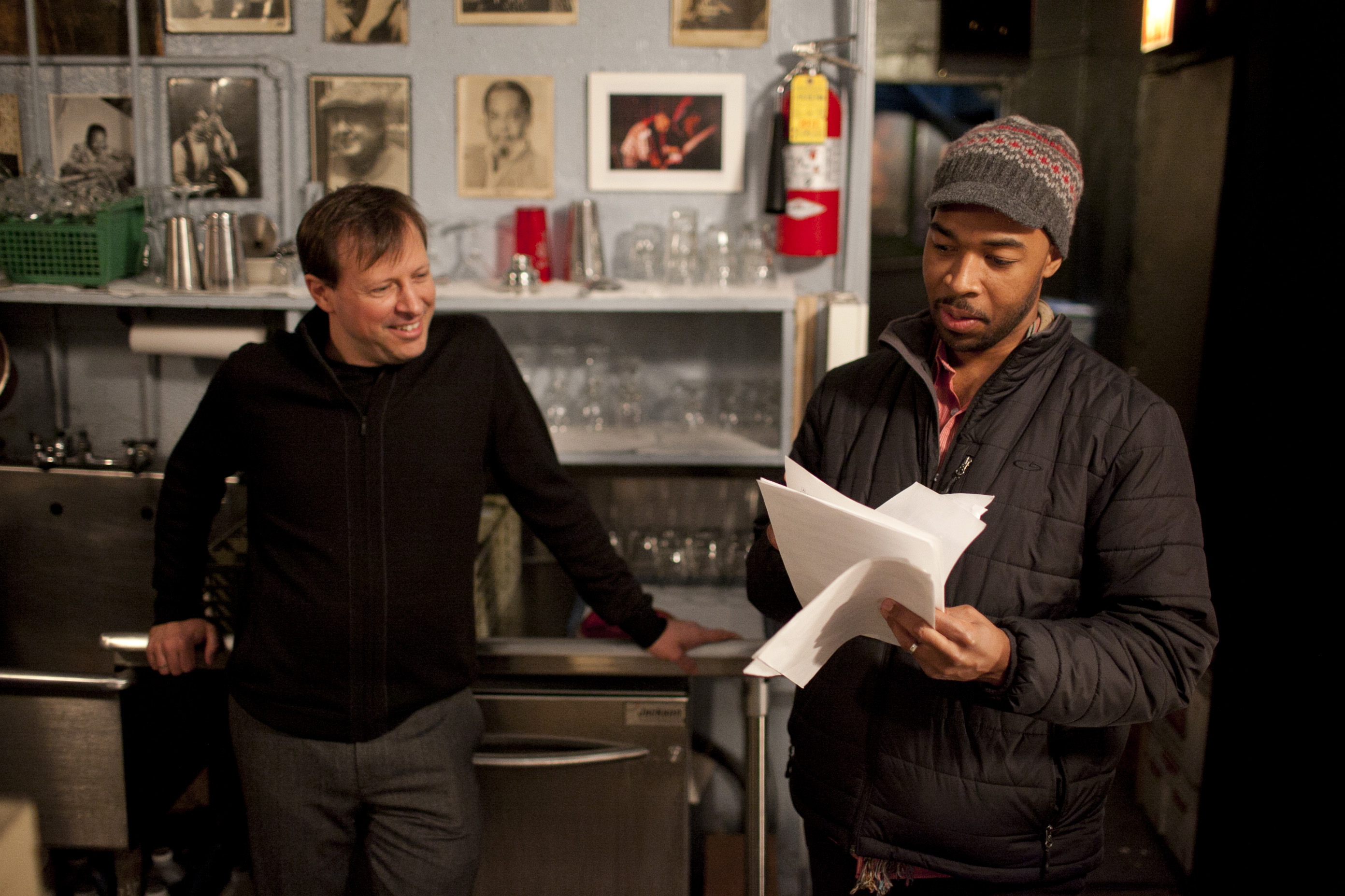 Chris Potter shows Eric Harland some music.