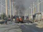 Afghan police and officials visit the site of a suicide attack in Kabul in September. A suicide bomber blew himself up alongside a minivan carrying foreigners on a major highway leading to the international airport in the Afghan capital, police said, killing at least 10 people, including nine foreigners. Afghan police and officials visit the site of a suicide attack in Kabul in September. A suicide bomber blew himself up alongside a minivan carrying foreigners on a major highway leading to the international airport in the Afghan capital, police said, killing at least 10 people, including nine foreigners.