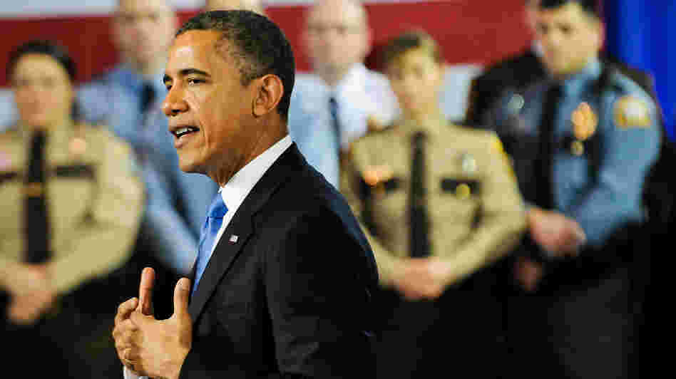 President Obama speaks about his gun control agenda before law enforcement officials in Minneapolis on Monday. The president was doing what his aides say he didn't do often enough in his first term: getting outside of Washington to build public support for legislation.