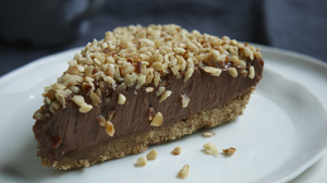Don't be tempted to let the cheesecake come to room temperature before serving. It slices and eats better with a bit of refrigerator chill on it.