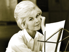 Doris Day's somber 1958 version of "Hooray for Hollywood," which was included on an album of the same name, better reflects the song's creatively complicated lyrics. Doris Day's somber 1958 version of "Hooray for Hollywood," which was included on an album of the same name, better reflects the song's creatively complicated lyrics.