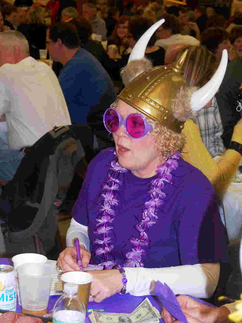 Not everyone dresses up for trivia night, but since her table at St. Rita was named for the Minnesota Vikings, Laura Mueller couldn't resist. Not everyone dresses up for trivia night, but since her table at St. Rita was named for the Minnesota Vikings, Laura Mueller couldn't resist.