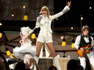 Taylor Swift gives the opening performance at the 55th Annual Grammy Awards Sunday in Los Angeles. Taylor Swift gives the opening performance at the 55th Annual Grammy Awards Sunday in Los Angeles.