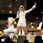 Taylor Swift gives the opening performance at the 55th Annual Grammy Awards Sunday in Los Angeles.