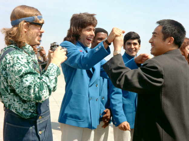 In this photo taken in April 1972 and released by China's Xinhua News Agency, Zhuang Zedong, right, shakes hands with U.S. table tennis player Glenn Cowan during a visit to the U.S. Zhuang, a key figure in 1971's groundbreaking "pingpong diplomacy" between China and the U.S., died in Beijing on Sunday. He was 72.