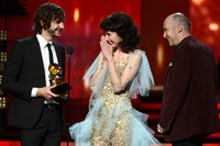 Musicians Gotye, Kimbra and William Bowden accept the Record of the Year award for