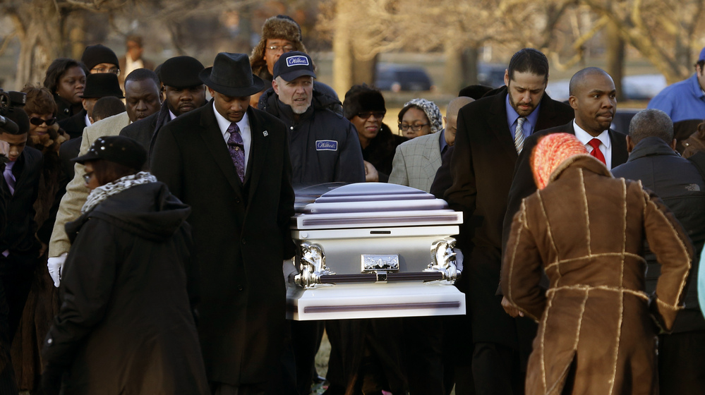 The remains of Hadiya Pendleton are taken to her final resting place at the Cedar Park Cemetery on Saturday in Calumet Park, Ill.