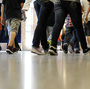Students walk in the hallway as they enter the lunch line of the cafeteria at Draper Middle School in Rotterdam, N.Y. Five states announced in December that they will add at least 300 hours of learning time to the calendar in some schools starting in 2013.
