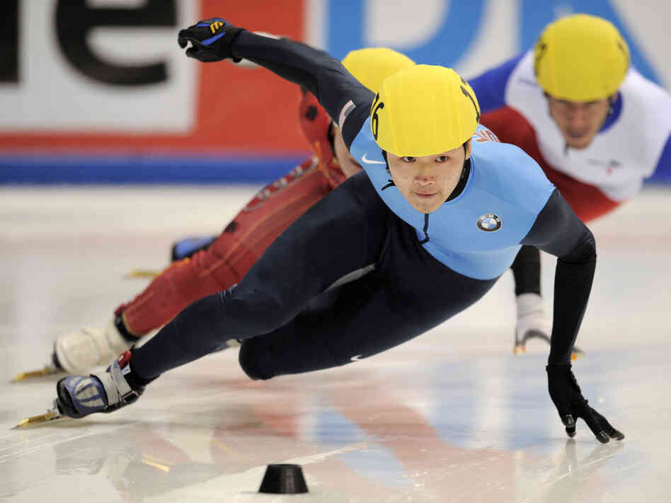 Simon Cho competes in the men's 500-meter finals at the 2011 ISU World Cup short track speedskating final in Dresden, Germany. He won the event.