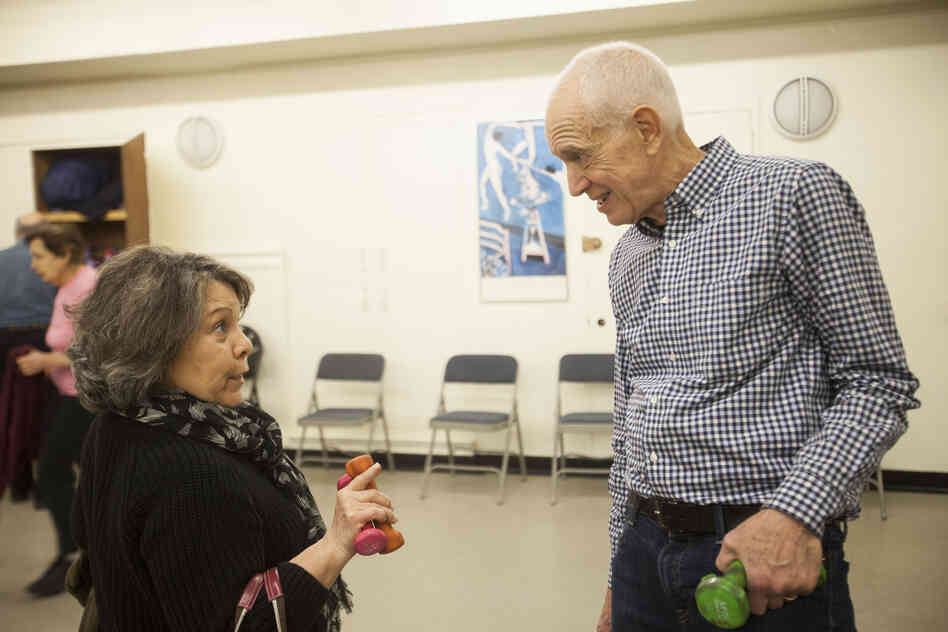 David chats with one of his students after his exercise class at the 92nd Street Y.