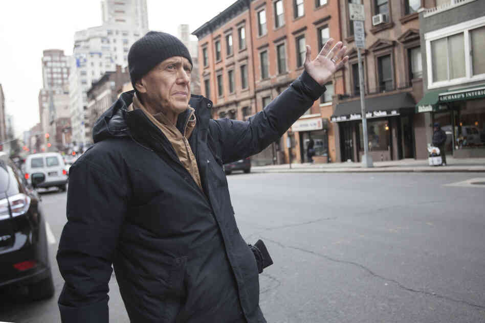 After his first class, David hails a taxi to head to his second class of the day at the Jewish Community Center in New York City.