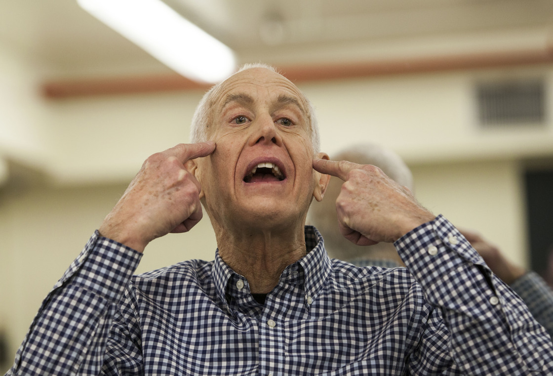 John David, 73, teaches an exercise class to seniors in New York City. His routine goes through every muscle, including those on the face.