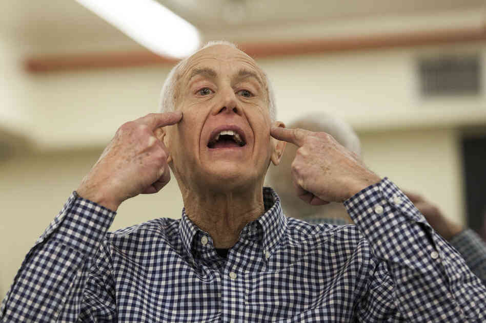 John David, 73, teaches an exercise class to seniors in New York City. His routine goes through every muscle, including those on the face.